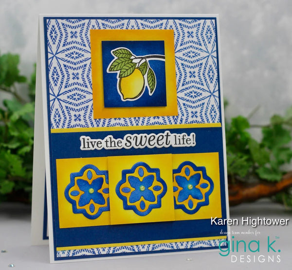 Decorative card with blue and yellow design featuring a lemon and floral elements, with 'live the sweet life!' text.