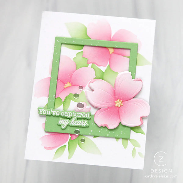 Card with pink flowers and green frame on a white background