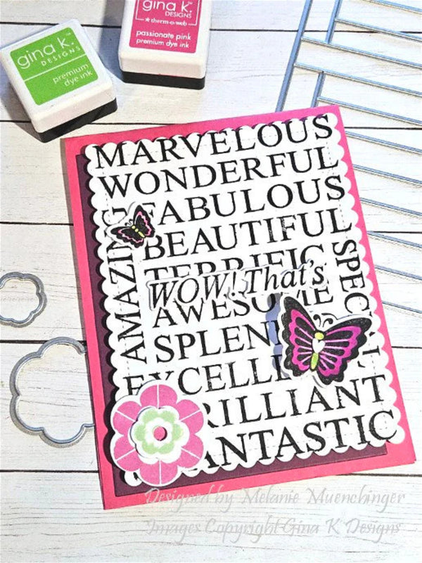 Card with positive words and butterfly design on a wooden surface with stamping supplies.
