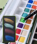 Watercolor paint set with a brush and color swatches on a white background