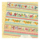 Colorful fabric with fruit patterns and text on a yellow background