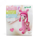 Crochet kit packaging for a pink llama toy with 'gröndl' branding.