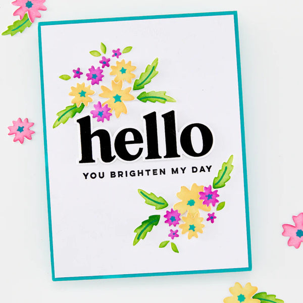Card with 'hello' and 'you brighten my day' text surrounded by colorful flowers on a white background.