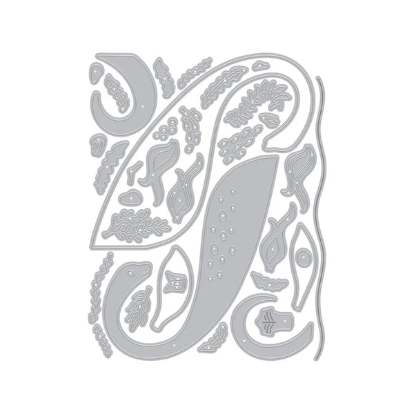 Decorative metal die cut shapes on a white background