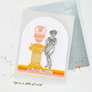 Greeting card with classical design elements and text 'you're a CLASSIC' on a light background.