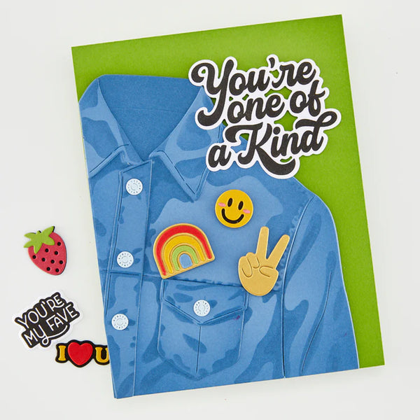 Card with blue jacket illustration and colorful patches on a green background