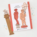 Birthday card with classical statue design and 'Happy Birthday, you're a classic' text on a white background.