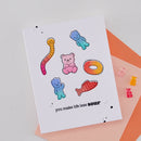 Card with colorful gummy bear illustrations and text on a white background