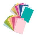 Assorted colorful paper sheets on a white background