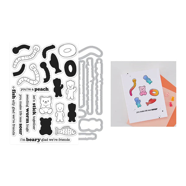 Set of clear stamps with various designs and a card with colorful illustrations on a white background.