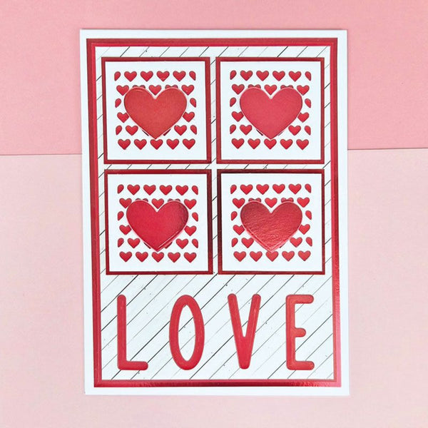 Card with red hearts and the word 'LOVE' on a pink background