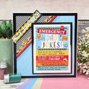 Framed poster with 'Emergency Dad Jokes' text and colorful design on a decorative surface.