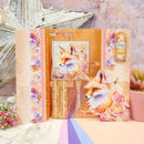 Decorative notebook with fox illustration on a textured surface