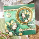 Decorative birthday card with artistic illustration of a woman with butterfly wings on a green background.