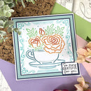 Card with floral design and 'So very grateful for you' message on a decorative surface with plants.
