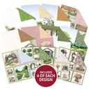 Collection of scenic paper sheets with houses and landscapes, including 4 of each design.