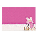 Pink towel with a small stool, shoes, and a cup on a white background