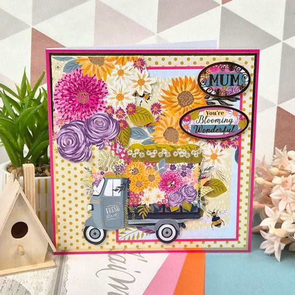 Greeting card with floral design and text on a colorful background