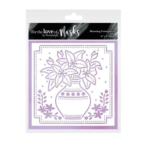 Packaging of a floral design mask with 'For the Love of Masks' branding.