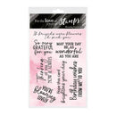 Set of clear stamps with various phrases on a pink watercolor background