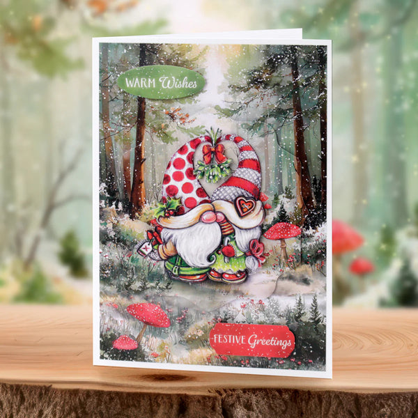 Christmas card with a gnome in a forest setting, featuring 'Warm Wishes' and 'Festive Greetings' text.