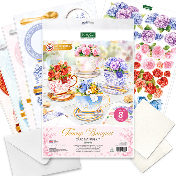 Card making kit with floral designs and cardstock sheets on a white background