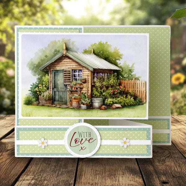 Garden scene with a small wooden shed and plants on a card with 'With Love' text.