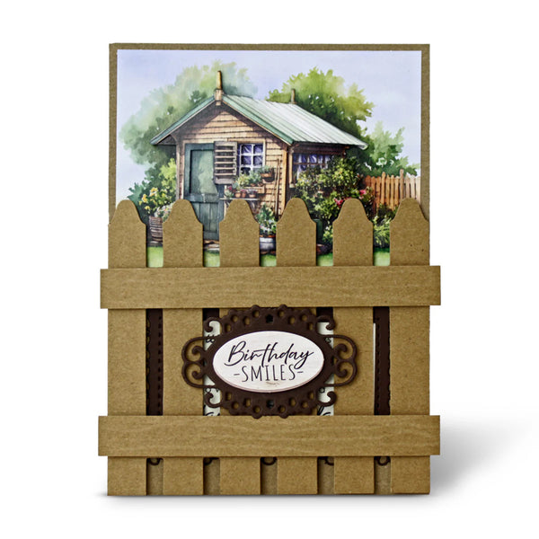 Card with a wooden fence design and a garden scene in the background