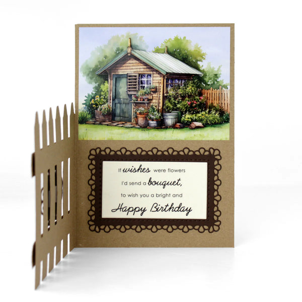 Garden-themed birthday card with a small cabin illustration and decorative text.