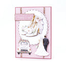 Wedding-themed card with high heels, car, and couple on a pink background