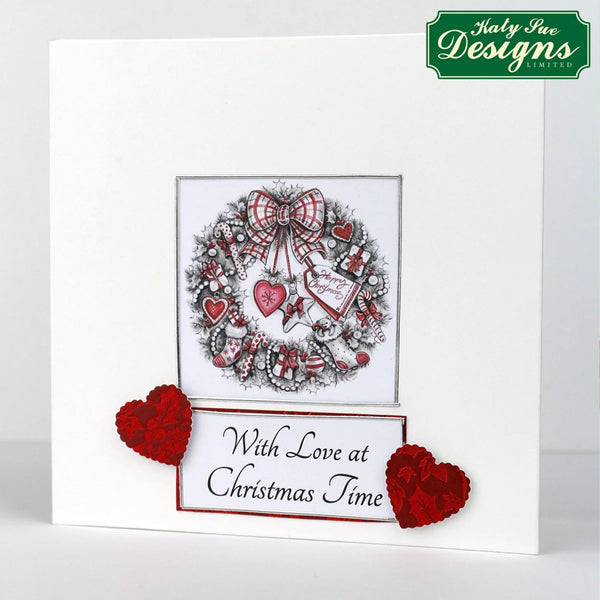 Decorative Christmas card with wreath, hearts, and text on a white background