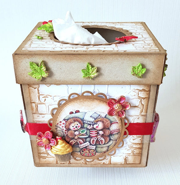 Decorative tissue box with teddy bear design on a white background