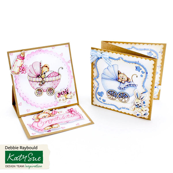 Two baby-themed greeting cards with teddy bears and buggies on a white background, featuring the Katy Sue brand.