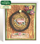 Card with tree ring design, heart, and flowers on a wooden texture background