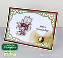 Greeting card with floral design and decorative bow, featuring Katelyn Fee Designs branding.