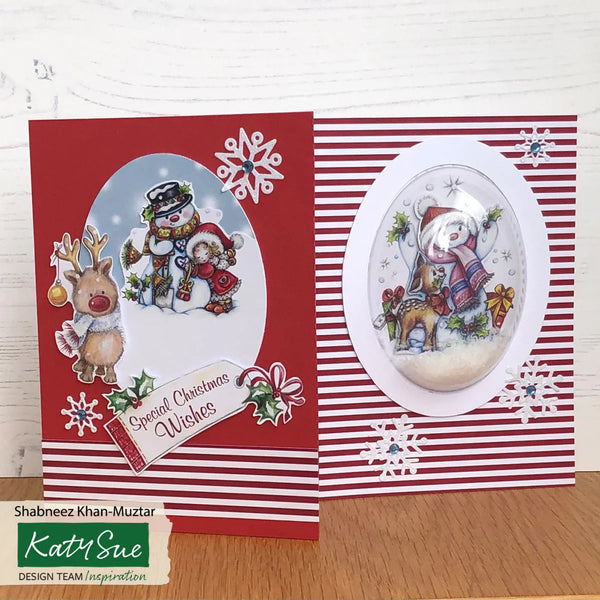 Christmas-themed card with reindeer, snowman, and snowflakes on a red and white striped background.