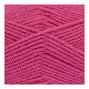 Close-up of bright pink yarn on a white background