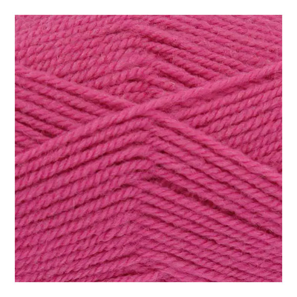Close-up of bright pink yarn on a white background