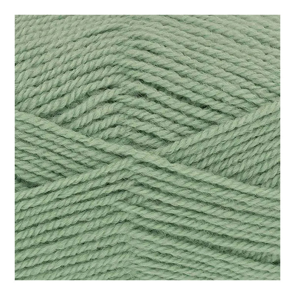 Close-up of green yarn on a white background