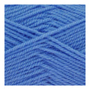 Close-up of blue yarn strands on a white background