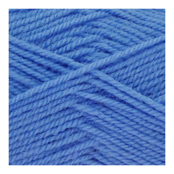 Close-up of blue yarn strands on a white background