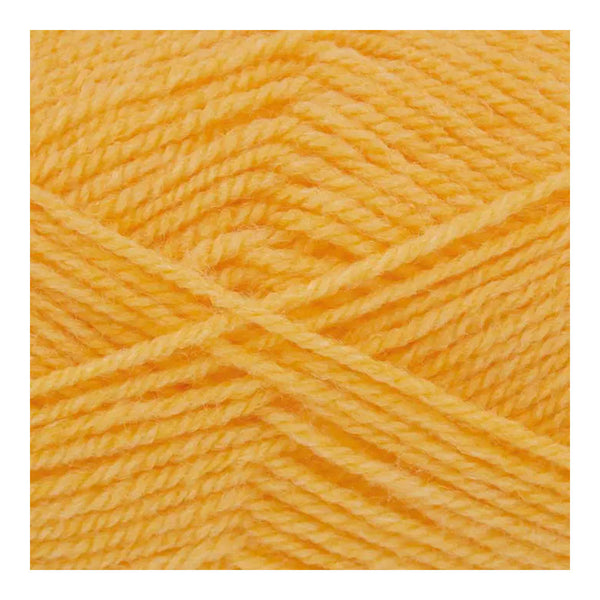 Close-up of bright orange yarn on a white background