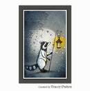 Framed artwork of a raccoon holding a lantern with stars and text on a dark background, created by Tracey Dutton.