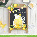 Decorative sign with lemons, a teapot, and text on a wooden background