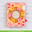 Colorful card with butterflies and 'Happy Mother's Day' text on a wooden surface