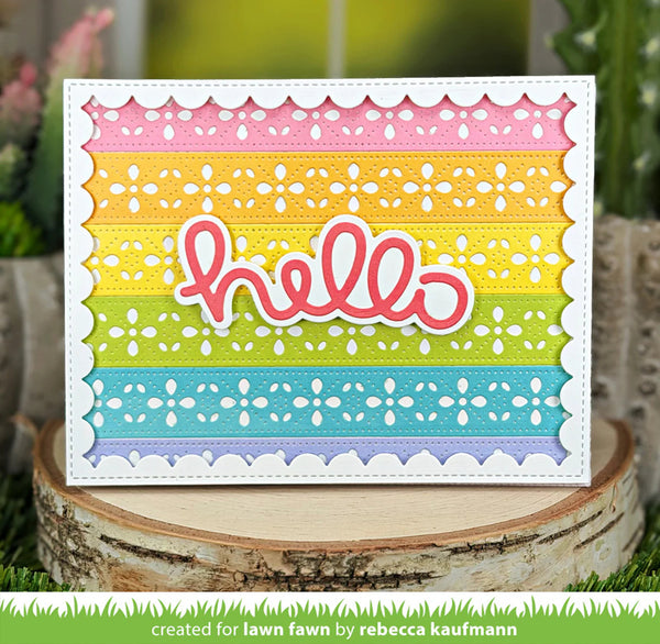 Colorful card with 'hello' text on a wooden block