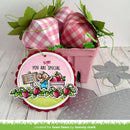 Card with strawberry design and 'Berry You're Special' message on a wooden surface.