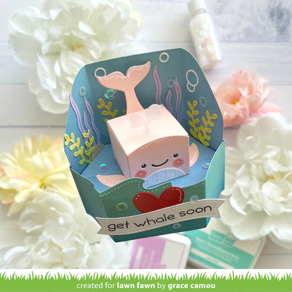Whale-themed card with 'get whale soon' text on a floral background