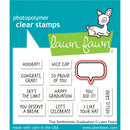 Lawn Fawn photopolymer clear stamps with graduation-themed phrases and a deer illustration on a blue background.