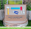 Card with tool-themed decorations and 'Happy Father's Day' message on a wooden stand with plants in the background.
